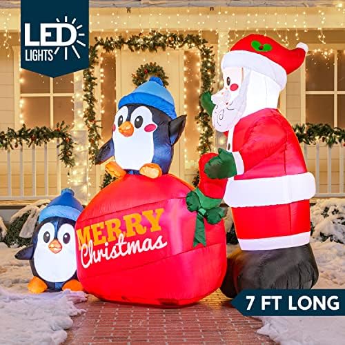 Joiedomi 7 ft долги Божиќни надувувања Дедо Мраз со пингвини, украси за Божиќни двор со надувување со вградени LED диоди, креваат надувување