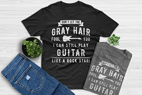 Смешно не дозволувајте сивата коса да ве измами, сè уште можам да свирам драмка за дедо на гитара, подарок за Денот на таткото